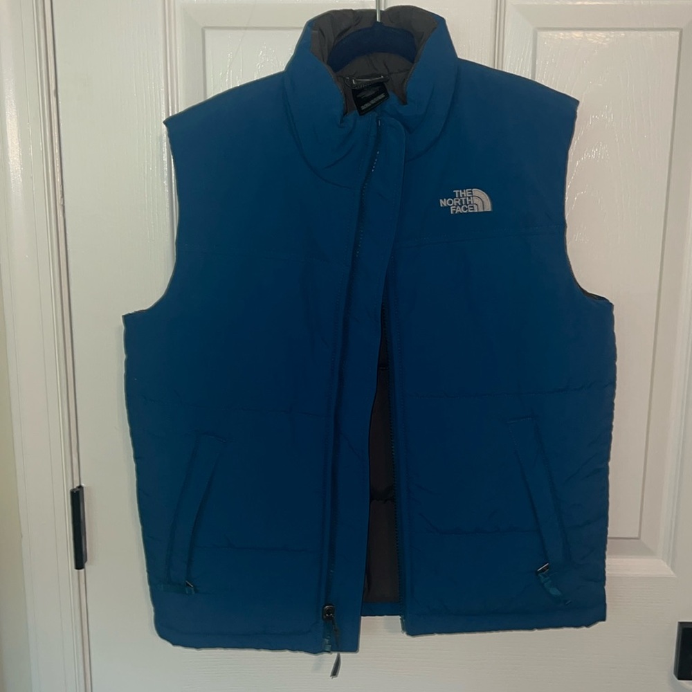 Boys blue north face vest size Medium
